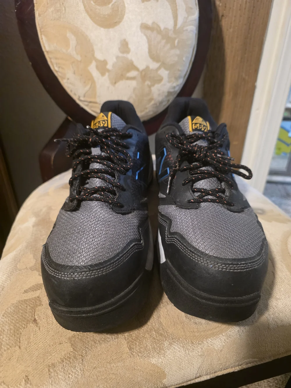 New Balance Gray and Black Men's Athletic Sneakers with Blue Accents